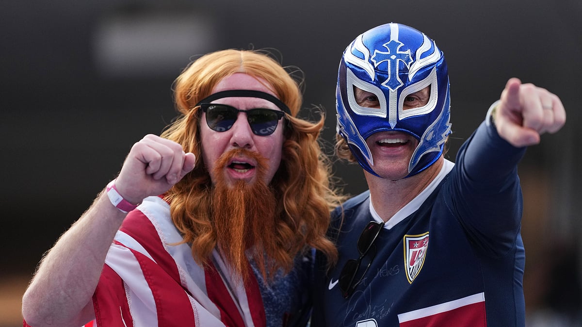 Fans of the United States wait for the beginning of the World Cup Group D soccer match between the United States and Paraguay in Inglewood, Calif., near Los Angeles, Friday, June 12, 2026.  - (AP Photo/Jae C. Hong)