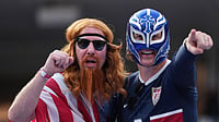 (AP Photo/Jae C. Hong) : Fans of the United States wait for the beginning of the World Cup Group D soccer match between the United States and Paraguay in Inglewood, Calif., near Los Angeles, Friday, June 12, 2026. 