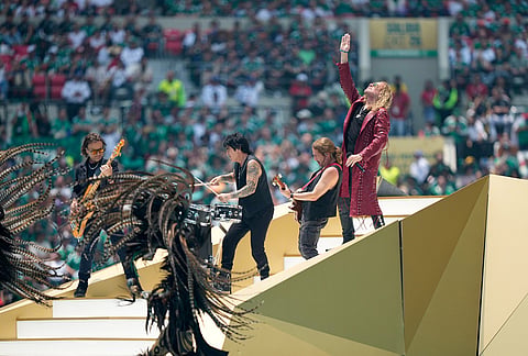 Mexican pop rock band Mana perform before the start of the World Cup Group A soccer match between Mexico and South Africa in Mexico City.