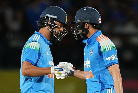 India's KL Rahul, left, and captain Shubman Gill toss during the first ODI cricket match between Afghanistan and India in Dharamshala.