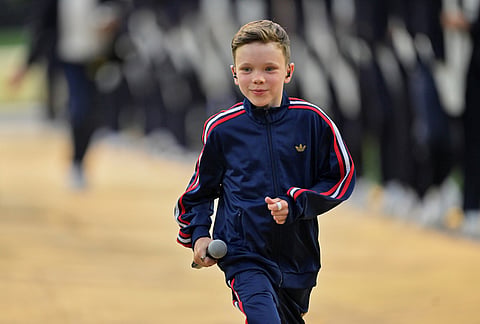 Tius Luka jogs off after performing with Katy Perry before the start of the World Cup Group D soccer match between Paraguay and the United States in Inglewood, California.
