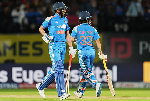 India's captain Shubman Gill, left, and Ishan Kishan run between the wickets during the first ODI cricket match between Afghanistan and India in Dharamshala.