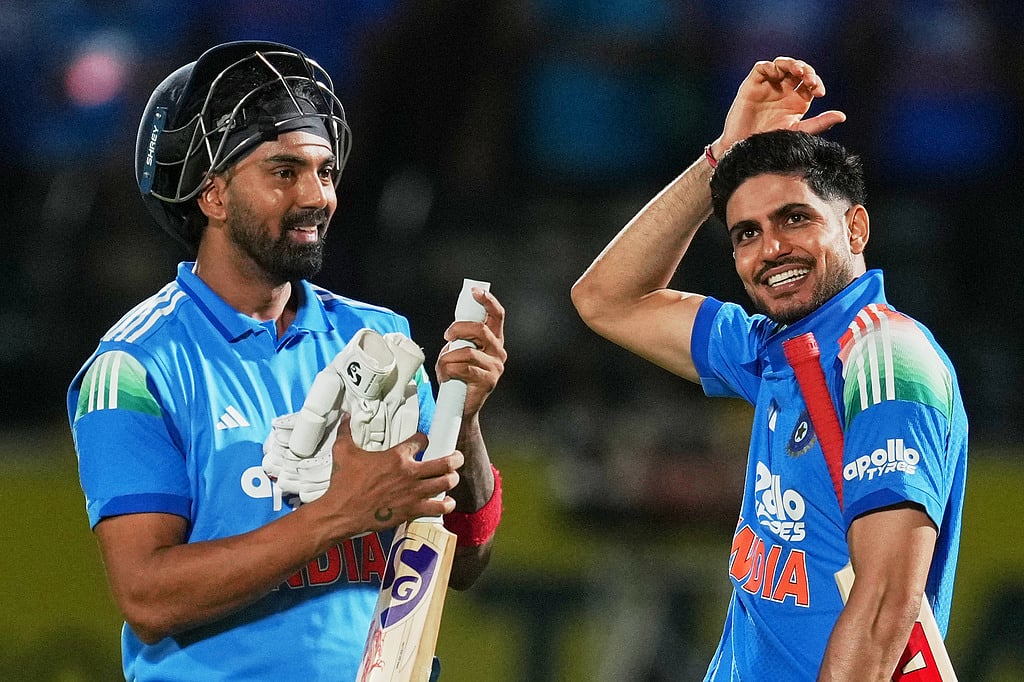 India's captain Shubman Gill, right, KL Rahul celebrate their victory during the first ODI cricket match between Afghanistan and India in Dharamshala. - | Photo: AP/Ashwini Bhatia