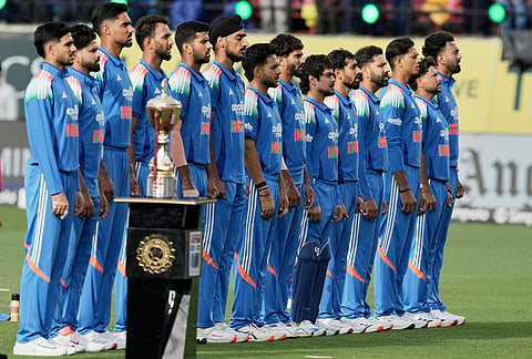 India's players stand up for their national anthem before the start of the first ODI cricket match between Afghanistan and India in Dharamshala.