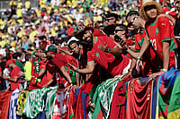AP Photo/Adam Hunger : Morocco fans before the start of the FIFA World Cup 2026, Group C soccer match between Brazil and Morocco in East Rutherford, N.J., near New York, Saturday, June 13, 2026.
