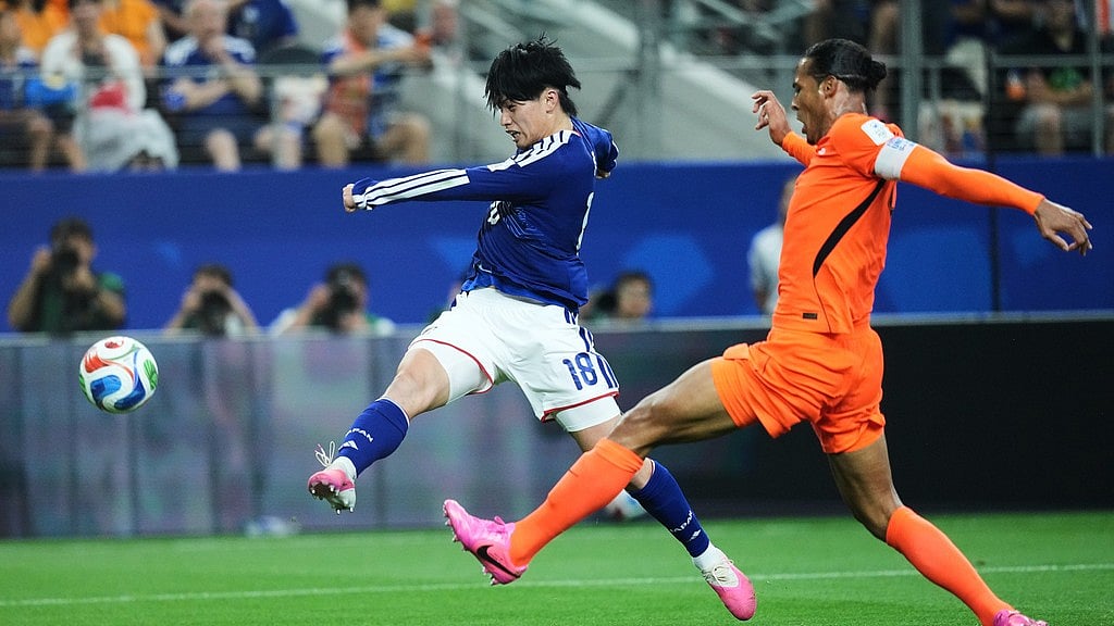 Japan's Ayase Ueda (18) and Netherlands' Virgil van Dijk battle for the ball during a World Cup Group F soccer match in Arlington, Texas. - AP Photo
