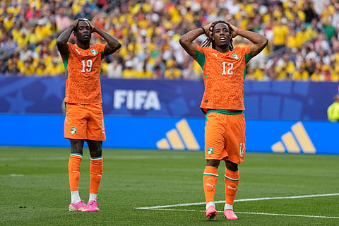 Ivory Coast's Elye Wahi, right, and teammate Nicolas Pepe react after missing a chance to score against Ecuador during a World Cup Group E soccer match in Philadelphia, Sunday, June 14, 2026.