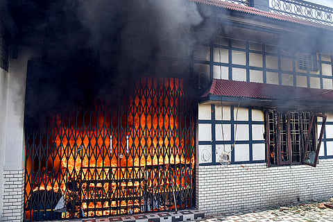 Flames billow from the residence of an accused, in the alleged killing of 44-year-old local BJP functionary in a clash on Saturday in Bairagiwala village, Dehradun. The deceased, Vinod, was allegedly killed on Saturday in a dispute over irrigation, and three members of his family were critically injured in the clash.