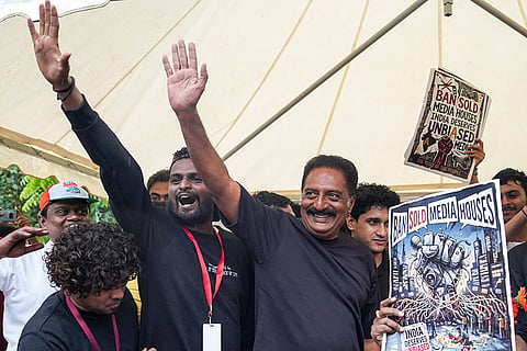 Actor Prakash Raj with Cockroach Janta Party (CJP) spokesperson Saurav Das and others during a protest by CJP demanding the resignation of Union Education Minister Dharmendra Pradhan over the NEET paper leak and irregularities related to CBSE's on-screen marking system, at Freedom Park, in Bengaluru, Karnataka.
