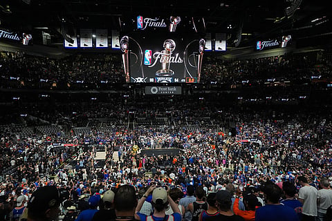 The New York Knicks celebrate after defeating the San Antonio Spurs in Game 5 of the NBA Finals basketball series in San Antonio.