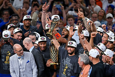New York Knicks guard Jalen Brunson holds the MVP trophy after the Knicks defeated the San Antonio Spurs in Game 5 of the NBA Finals basketball series in San Antonio.