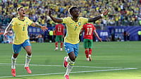 AP Photo/Adam Hunger : Brazil's Vinicius Junior (7) celebrates a goal in the first half during the World Cup Group C soccer match between Brazil and Morocco in East Rutherford, N.J., near New York, Saturday, June 13, 2026. 