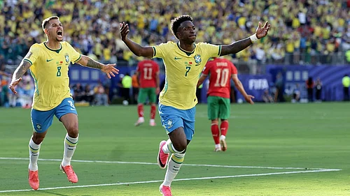 AP Photo/Adam Hunger : Brazils Vinicius Junior (7) celebrates a goal in the first half during the World Cup Group C soccer match between Brazil and Morocco in East Rutherford, N.J., near New York, Saturday, June 13, 2026.