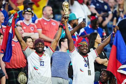 Haiti supporters react ahead of the World Cup Group C soccer match between Haiti and Scotland in Foxborough, Mass., near Boston, Saturday, June 13, 2026.