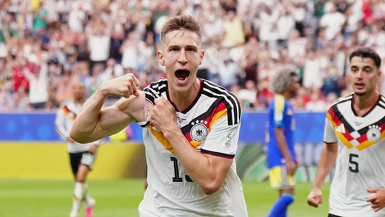 Germany's Nico Schlotterbeck celebrates after scoring his side's second goal during the World Cup Group E soccer match between Germany and Curacao in Houston, Sunday, June 14, 2026. - (AP Photo/Karen Warren)