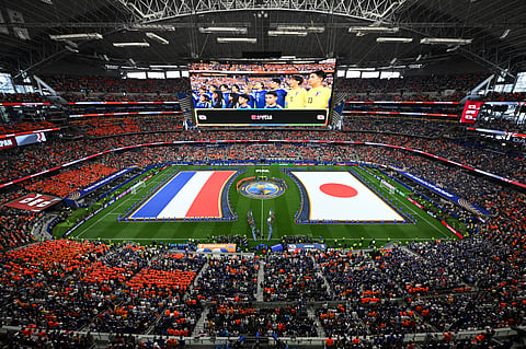 Flags are displayed on the pitch for the national anthem before the World Cup Group F soccer match between the Netherlands and Japan in Arlington, Texas, near Dallas, Sunday, June 14, 2026.