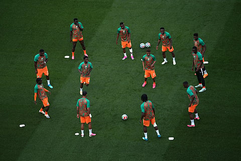 Ivory Coast players warm up before the World Cup Group E soccer match between Ivory Coast and Ecuador in Philadelphia, Sunday, June 14, 2026.