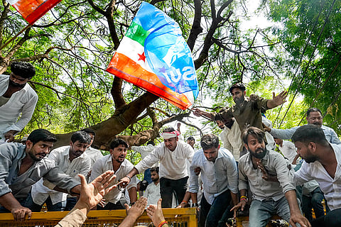 National Students' Union of India (NSUI) members stage a protest against the alleged NEET paper leak, in Lucknow.