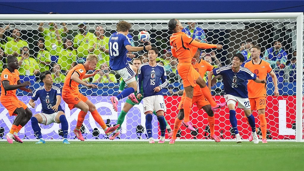Japan's Koki Ogawa heads the ball during a World Cup Group F soccer match against the Netherlands in Arlington, Texas, near Dallas. - AP Photo