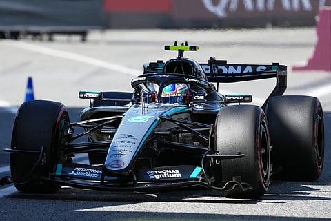 Mercedes driver George Russell of Britain returns to the pits after session for the Spain F1 Grand Prix at the Barcelona Catalunya racetrack in Montmelo, near Barcelona, Spain.