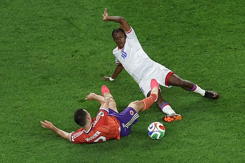 Haiti's Jean-Ricner Bellegarde (10) battles for the ball with Scotland's John McGinn (7) during the World Cup Group C soccer match between Haiti and Scotland in Foxborough, Mass., near Boston, Saturday, June 13, 2026.