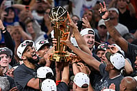 | Photo: AP/Darren Abate : The New York Knicks celebrate with the Larry O'Brien Championship Trophy after defeating the San Antonio Spurs in Game 5 of the NBA Finals basketball series in San Antonio.