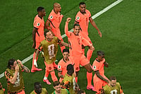 Netherlands Vs Japan, FIFA World Cup: See Best Photos Of Group F Match From Texas' Dallas Stadium AP Photo/Jessica Tobias : Netherlands' Virgil van Dijk (4) celebrates with teammates after scoring the opening goal during the World Cup Group F soccer match between the Netherlands and Japan in Arlington, Texas, near Dallas, Sunday, June 14, 2026.