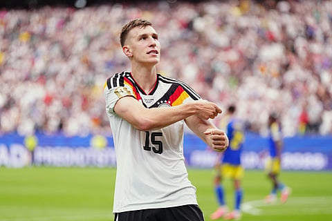 Germany's Nico Schlotterbeck celebrates after scoring his side's second goal during the World Cup Group E soccer match between Germany and Curacao in Houston, Sunday, June 14, 2026. 