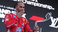 | Photo: AP/Fatima Shbair : Ferrari driver Lewis Hamilton, of Britain, reacts on the podium after taking second place during the Formula One Monaco Grand Prix race at the Monaco racetrack.