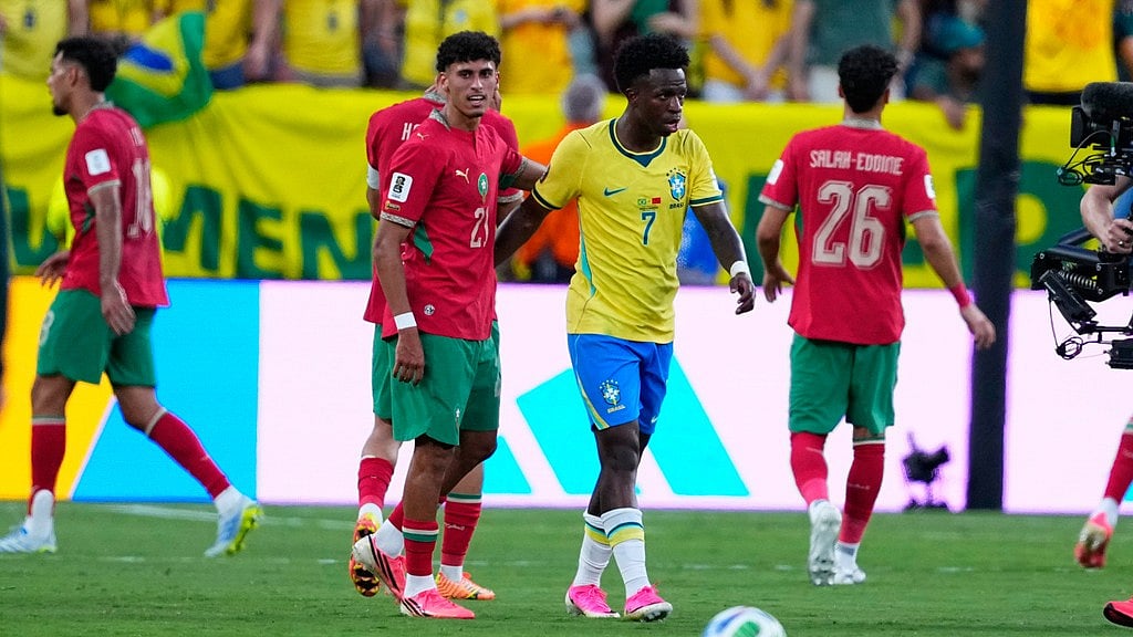 Brazil's Vinicius Junior, right, greats Morocco's Ayoub Amaimouni at the end of the World Cup Group C soccer match between Brazil and Morocco in East Rutherford. - AP Photo