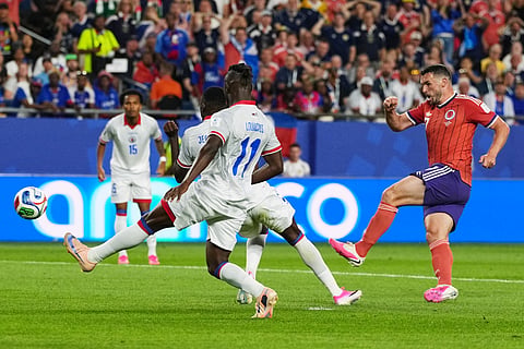 Scotland's John McGinn (7) scores his team's first goal during the World Cup Group C soccer match between Haiti and Scotland in Foxborough, Mass., near Boston, Saturday, June 13, 2026.