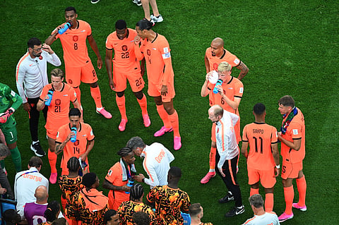 Members of the Netherlands cool down during the World Cup Group F soccer match between the Netherlands and Japan in Arlington, Texas, near Dallas, Sunday, June 14, 2026.