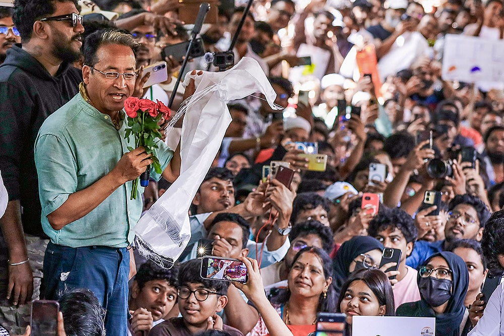 Activist Sonam Wangchuk addresses a gathering during a protest staged by Cockroach Janta Party and other organisations, demanding the resignation of Union Education Minister Dharmendra Pradhan over the NEET paper leak and the irregularities related to the CBSE’s on-screen marking system, at Dharna Chowk, in Hyderabad, Telangana. - | Photo: PTI