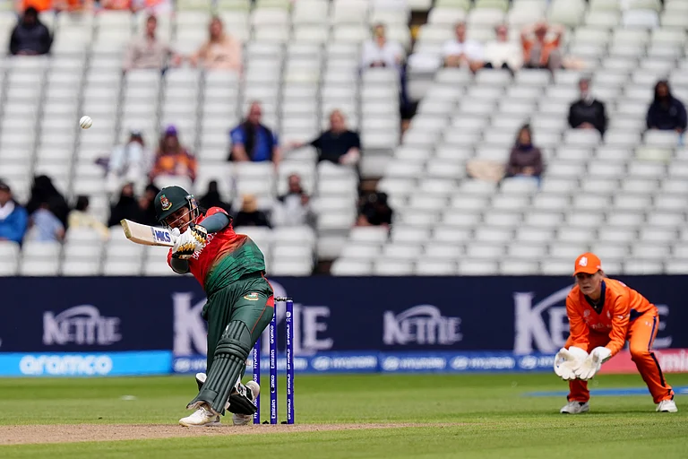 Bangladesh's Juairiya Ferdous hits a boundary during the ICC Women's T20 World Cup, Group 1 match between Bangladesh and Netherlands at Edgbaston - Jacob King/PA via AP