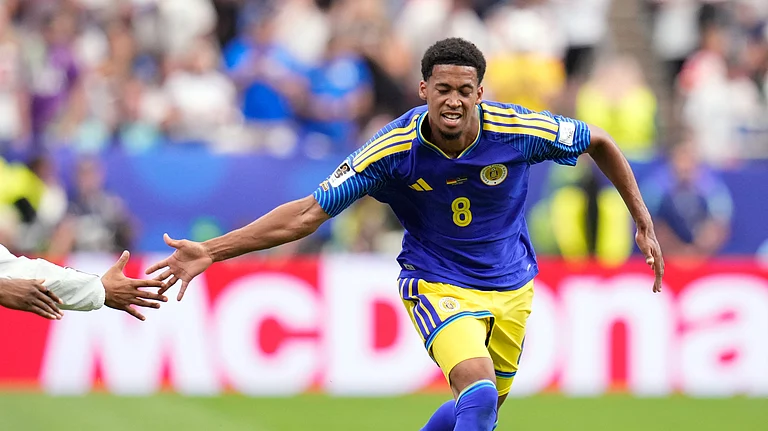 Curaçao's Livano Comenencia celebrates after scoring the opening goal during the World Cup Group E soccer match between Germany and Curacao in Houston, Sunday, June 14, 2026. - (AP Photo/Karen Warren)