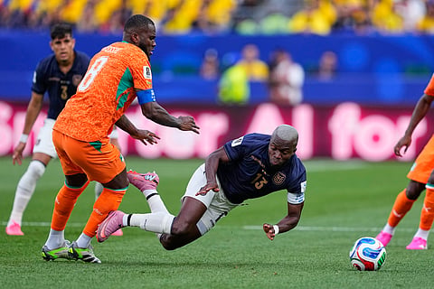 Ivory Coast's Franck Kessie (8) and Ecuador's Enner Valencia (13) compete for the ball during the World Cup Group E soccer match between Ivory Coast and Ecuador in Philadelphia, Sunday, June 14, 2026.