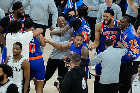 The New York Knicks celebrate after defeating the San Antonio Spurs in Game 5 of the NBA Finals basketball series in San Antonio.