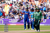 Jacob King/PA via AP : India's Smriti Mandhana hits her 50th run during the ICC Women's T20 World Cup, Group 1 cricket match between India and Pakistan