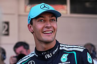 | Photo: AP/Fatima Shbair : Mercedes driver George Russell of Britain celebrates his pole position after qualifying session for the Spain F1 Grand Prix at the Barcelona Catalunya racetrack in Montmelo, near Barcelona, Spain.