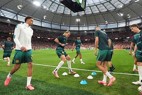 Australian players warm up before the World Cup Group D soccer match between Australia and Turkey in Vancouver, British Columbia, Saturday, June 13, 2026.