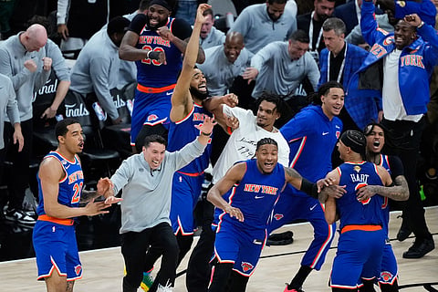 The New York Knicks celebrate after defeating the San Antonio Spurs in Game 5 of the NBA Finals basketball series in San Antonio.
