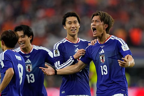 Japan's Koki Ogawa, right, celebrates after scoring during the World Cup Group F soccer match between the Netherlands and Japan in Arlington, Texas, near Dallas, Sunday, June 14, 2026.