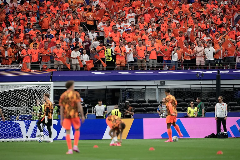 Dutch fans cheer before the World Cup Group F soccer match between the Netherlands and Japan in Arlington, Texas, near Dallas, Sunday, June 14, 2026. - AP Photo/Tony Guttierez
