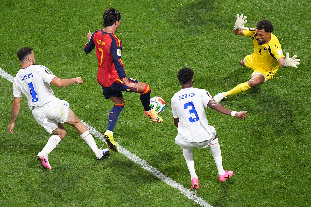 Spain's Ferran Torres (7) takes a shot on Cape Verde goalkeeper Vozinha (1) during the World Cup Group H soccer match between Spain and Cape Verde in Atlanta, Monday, June 15, 2026. - AP Photo/Jacob Kupferman