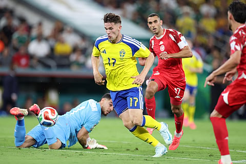 Sweden's Viktor Gyokeres (17) drives past Tunisia goalkeeper Mouhib Chamakh (1) during the World Cup Group F soccer match between Sweden and Tunisia in Guadalupe, near Monterrey, Mexico, Sunday, June 14, 2026.