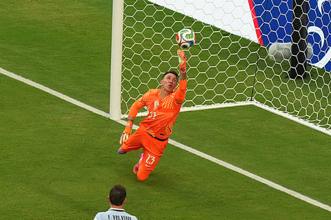 Uruguay goalkeeper Fernando Muslera (23) stops a shot during the World Cup Group H soccer match between Saudi Arabia and Uruguay in Miami Gardens, Fla., Monday, June 15, 2026.