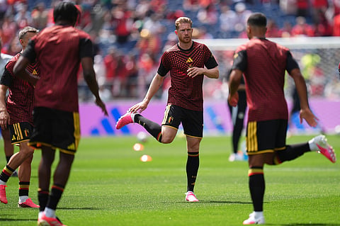 Belgium's Kevin De Bruyne, takes part in the warm up ahead of the World Cup Group G soccer match between Belgium and Egypt in Seattle
