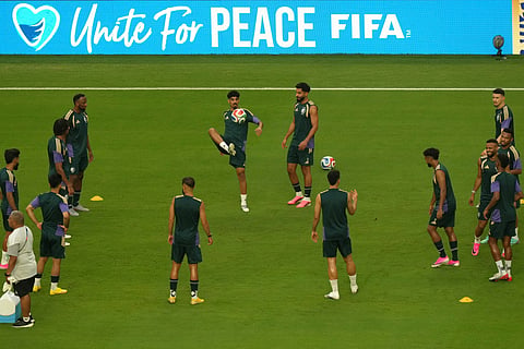 Saudi Arabia players warm up before the World Cup Group H soccer match between Saudi Arabia and Uruguay in Miami Gardens, Fla., Monday, June 15, 2026.