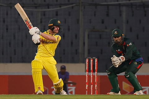 Australia's Oliver Peake plays a shot during the third one day international cricket match between Australia and Bangladesh, in Mirpur, Bangladesh.