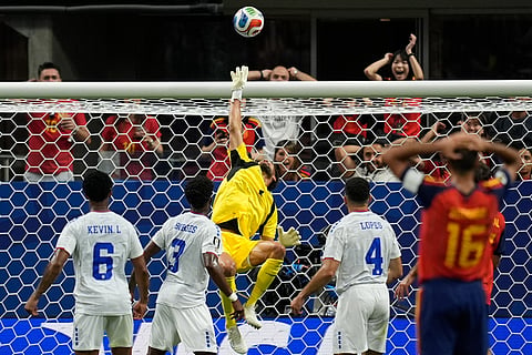 Cape Verde goalkeeper Vozinha (1) makes a save during the World Cup Group H soccer match between Spain and Cape Verde in Atlanta, Monday, June 15, 2026.
